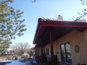 Seamless rain gutter on a pitched roof home.