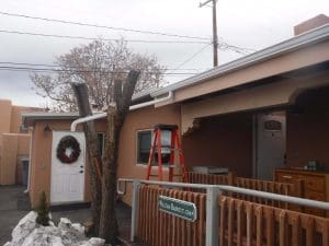 From our photo portfolio. Seamless rain gutter on a pitched roof home.