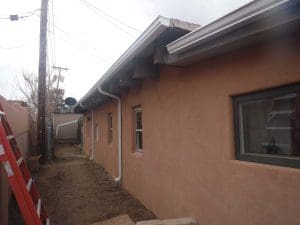 From our photo portfolio. Seamless rain gutter on a pitched roof home.